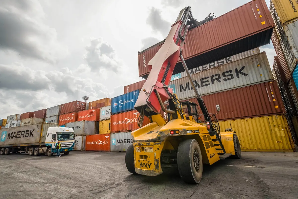 AFICD reach stacker handling a shipping container